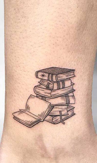 Love books and tattoos? Then you are in the right place! We have put together 23 awesome literary tattoos for book lovers. We have illustrations from books, portraits of authors, quotes and more. There is something for every bibliophile. Take a look and see what tattoo design you would like next. 1. Roald Dahl’s Matilda Tattoo […] #tattooideas #quotetattoos #tattoos Tattoos For Book Lovers, Matilda Tattoo, Awesome Tattoo Ideas, Music Quote Tattoos, Authors Quotes, Upper Leg Tattoos, Science Tattoos, Literary Tattoos, Awesome Tattoo