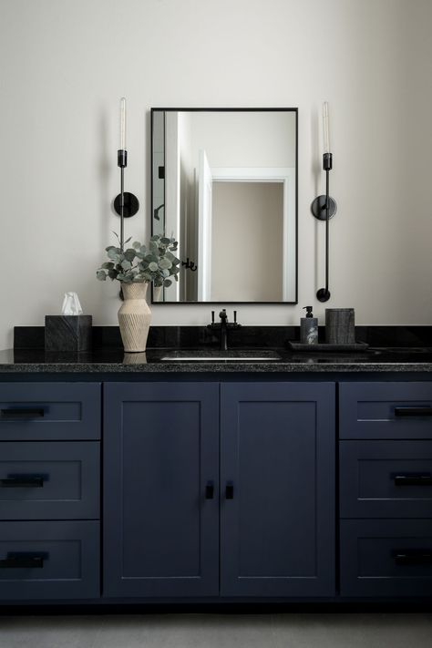 These blue cabinets create such a charming vibe in this bathroom 🤩🖤  #micahandco #timelesswithanedge  Designer/Design Firm: @micahabbanantoandco Builder: @jaggershomedesign Photography: @ktminteriors Navy Blue Bathroom Cabinets, Navy Bathroom Cabinets, Blue Bathroom Cabinets, Dark Blue Bathroom Vanity, Secret Basement, Dark Blue Bathrooms, Grey Bathroom Cabinets, Grey Cupboards, Navy Cabinets