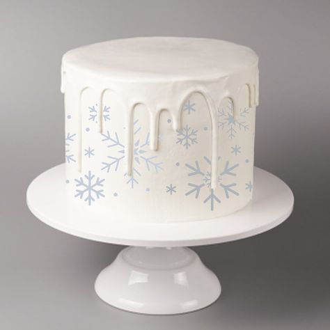 This wintry cake stencil features falling snowflakes that will make any holiday cake extra special. Our stencils can be used with royal icing, airbrushing and any other confectionery medium. Works beautifully with our Snowflake Cake Stencil Top Trio. Sizing (sheet sizing includes thumb-holds): Sheet Size: 4.5" h x 8" w / Design: 3.5" h x 5"w Sheet Size: 4.5" h x 16" w / Design: 3.7" h x 12.7"w Custom Cake Stencils: Contact us today or start a chat conversation with us if you need this in a diffe Winter Snowflake Cake, Snowflake Cake Ideas, Snowflake Cake Birthday, Winter Birthday Cakes, Winter Onederland Smash Cake, Winter Theme Cake, Winter Onederland Cake Smash, Snowflake Birthday Cake, Winter Themed Cake