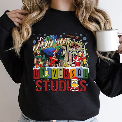 Universal Studios Christmas Shirt, Holiday At Universal 2023 Shirt, Family Christmas Vacation Shirt, Disney World Trip Tee,Hollywood Studios Check more at https://jerryclothing.com/product/universal-studios-christmas-shirt-holiday-at-universal-2023-shirt-family-christmas-vacation-shirt-disney-world-trip-teehollywood-studios/ Universal Studios Christmas Shirts, Universal Studios Christmas, Universal Studios Jurassic Park, Christmas Vacation Shirt, Universal Hollywood, Christmas Vacation Shirts, World Trip, Travel Tees, Maternity Tees