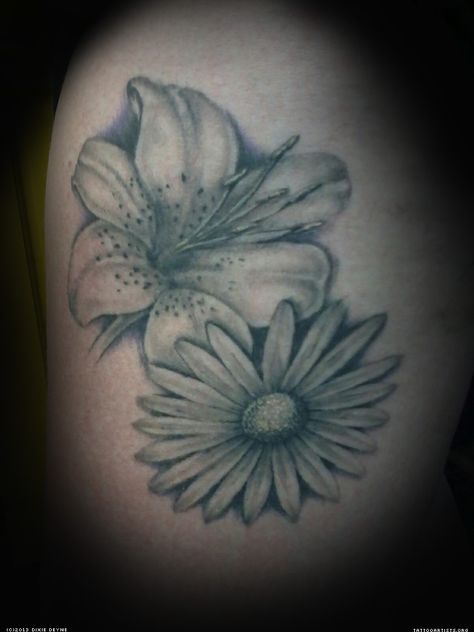 Lily and daisy tatt Lily Daisy Tattoo, Tattoos Lily, Daisy Flower Tattoos, Stomach Tattoo, Flower Tattoo Drawings, Foot Tattoos For Women, Tattoos For Women Flowers, Daisy Tattoo, Best Tattoo Ideas