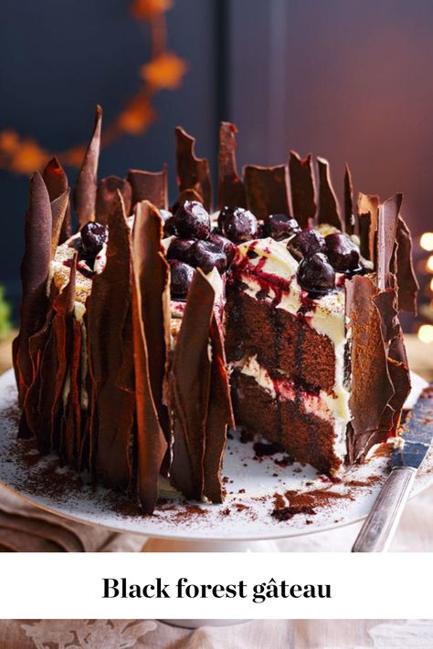 Layers of chocolate sponge, cream and boozy kirsch cherries provide the building blocks for this classic black forest gateau. We’ve decorated ours with chocolate shards, too, for a more striking aesthetic. Try serving it as an alternative Christmas dessert or as a dinner party show-stopper.   #fall #fallaesthetic #fallrecipes #fallbaking #berries #chocolate #chocolate cake Christmas Chocolate Recipes, Black Forest Gateau, Black Forest Cake, Delicious Magazine, Forest Cake, Chocolate Sponge, Mary Berry, Christmas Chocolate, Chocolate Cake Recipe