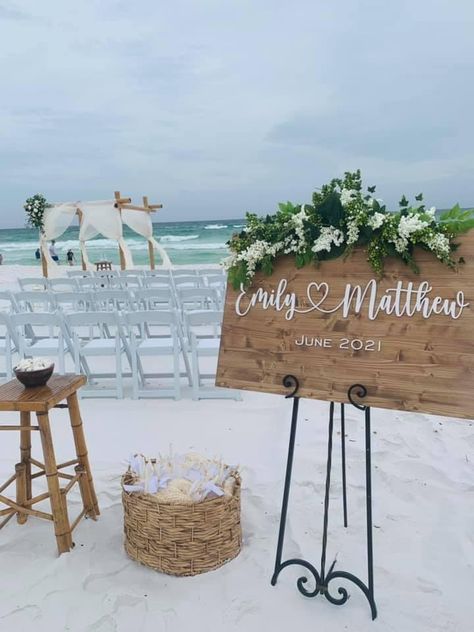 Ceremony set up (sign, bamboo fans with basket, blessing shells, arbor, lanterns in aisle) Wedding Ceremony Beach Decor, Standing Ceremony, Beach Wedding Details, Wedding Ceremony Chairs, Bamboo Fan, Dream Beach Wedding, Ceremony Chairs, Wedding Ceremony Signs, Bamboo Chair