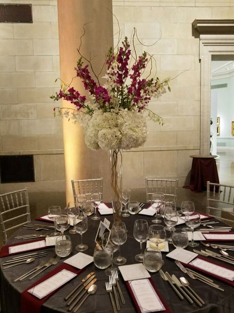 BMA wedding tables set with gray linens and burgundy and white flowers. #reception#burgundyandwhite,orchids#hydrangea#curlywillow Burgundy And Gray Wedding Decorations, Burgundy And Gray Wedding, Gray Wedding Decorations, Corporate Cocktail Party, Cocktail Party Decorations, Burgundy And Grey Wedding, Cocktail Party Decor, Wedding Renewal, Tables Set