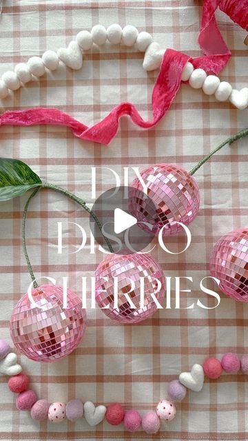 Aurelie Erikson on Instagram: "DIY Disco Ball Cherries 🍒🪩

If disco balls are your vibe, these are a DIY must!🍒
What you’ll need ~ 
* two disco balls (any size will work) 
* floral stem wire 
* green yarn 
* large faux leaves 
* hot glue 

Shop supplies in my Amazon storefront 🍒

save & share with disco lovin friend 🪩🫶🏼
.
.
.
.
.
.
#discoball #discoballdecor #discoballs #diyvalentines #diyhomedecor #homehacks #valentinedecor #whimsical #anthrohome #diycrafts #pinkaesthetic #pinklovers" Disco Ball Cherries, Disco Tiles, Aurelie Erikson, Diy Disco Ball, Green Yarn, Faux Leaf, Disco Balls, Amazon Storefront, Instagram Diy