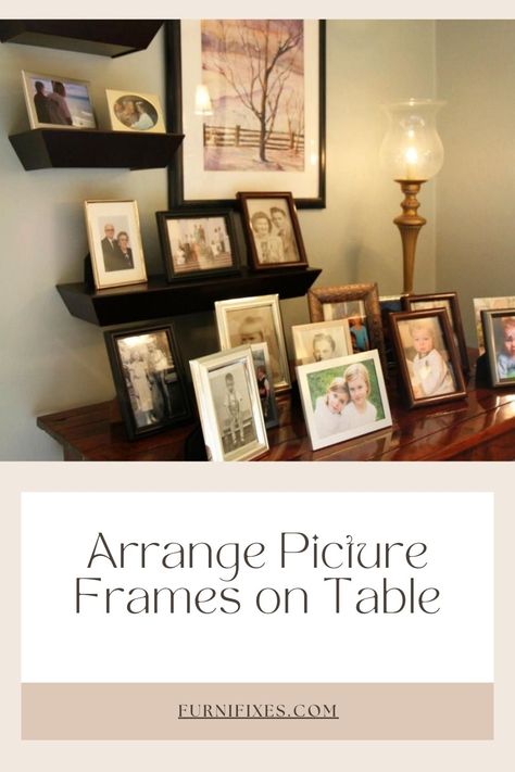 Arrange Picture Frames on Table Table With Framed Photos, Picture Frames On Table, Frames On Table, Picture Frames Display, Frame Arrangement, Picture Frame Table, Picture Arrangements, Picture Frames Standing, Painted Vanity