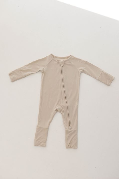 Made of the softest premium bamboo. Durable and well designed your little ones can sleep and play in these cozy pajamas. Our smallest sizes have rollover cuffs on the hands and all of the one piece sizes have cuffs on the feet giving you the option to go footless or footed without changing outfits. Sizes available in newborn - 24 months Material : 95% bamboo viscose / 5% spandexA key benefit of bamboo clothing is that it is naturally hypo-allergenic, gentle on the skin, and highly breathable. It keeps skin cool in summer and warm in winter by wicking away any excess moisture. No need for both summer and a winter wardrobe – with bamboo clothing you babe will you be comfortable year round.Care Instructions : Wash with like colorsTumble dry on low or hang dryExclusively available at Forever F Bamboo Clothes, Baby Bamboo, French Baby, Cozy Pajamas, Bamboo Clothing, Dress Romper, Blouse Dress, Winter Wardrobe