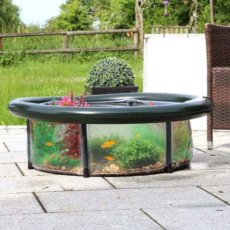 PRICES MAY VARY. [OUTDOOR POND KIT] - Constructed from a special polymer material you can now set up a beautiful water garden or stunning outdoor aquarium in minutes. GREAT FOR RAISING TADPOLES AND SMALL FRESH WATER FISH. [LARGE SIZE] - 700mm / 27.5 inches Diameter x 270mm / 10.62 inches high. Capacity is 105 l / 23 imperial gallons. [FISH SAFE DUAL FLOW] - ‘fish safe’ variable drain valve – to allow for easily and safe drainage and water change to allow easy cleaning. [AERATION PUMP INCLUDED] - Raised Pond, Patio Kits, Pond Kits, Pond Cleaning, Water Gardens Pond, Aquarium Pump, Outdoor Ponds, Garden Water Feature, Pond Water Features