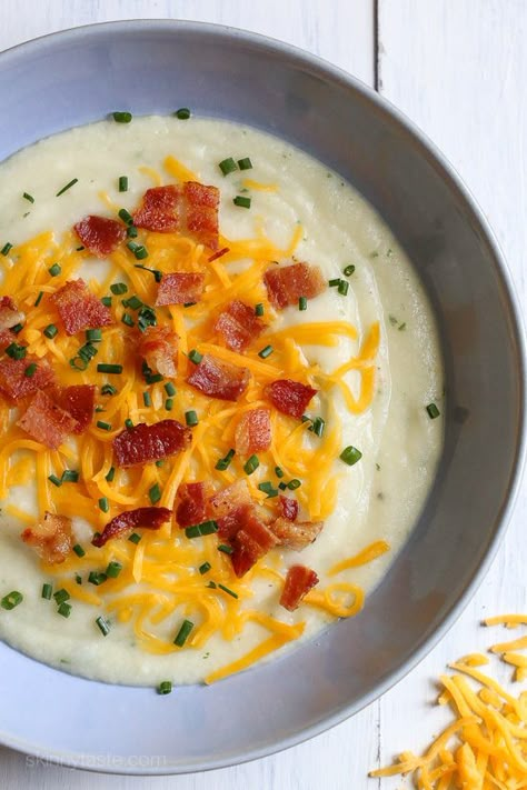 This slimmed down version of a loaded baked potato soup has everything you love about a baked potato – sour cream, cheddar, bacon and chives, at a fraction of the calories! Baked Potato Sour Cream, Loaded Baked Potato Soup Recipe, Soup Sunday, Baked Potato Soup Recipe, Loaded Baked Potato Soup, Loaded Baked Potato, Baked Potato Soup, Loaded Baked Potatoes, Potato Soup Recipe