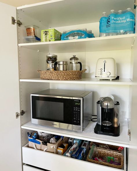 Pax pantry with bottled water, storage containers and appliances Pax Pantry, Pantry Hacks, Ikea Pantry, Ikea Pax Hack, Appliance Garage, Ikea Pax Wardrobe, Hidden Kitchen, Pax Wardrobe, Kitchen Design Trends