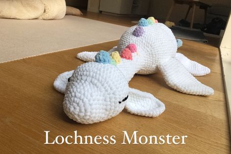 New Lochness Monster Nessie. Amazing pattern designed by @moontyasha #crochet #amigurumi #nessiecrochet #bigcrochetproject #tooktoolongtomake Crochet Lochness Monster, Crochet Nessie Pattern Free, Nessie Crochet Free Pattern, Crochet Nessie, Lochness Monster, Knit Top Patterns, Fair Booth, Micro Crochet, Ren Fair