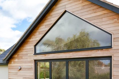 Raked windows from Idealcombi UK - sloping, angled & triangle windows Triangle Windows, Window Above Door, Triangle Window, Loft Windows, Triangle House, Shaped Windows, Self Build, Nantucket Style, Beach House Exterior