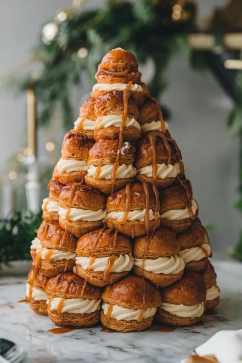 A photo of a  New Year’s Croquembouche a New Years Dessert ideas Croquembouche Christmas, Croquembouche Tower, New Years Dessert Ideas, New Years Dessert, Dessert Tower, New Year's Desserts, Impressive Recipes, Ring In The New Year, Sweets Desserts