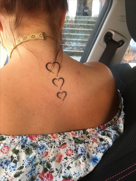 My 1st Tattoo! 3 hearts, back of my neck Tattoo 3 Hearts, Heart Back Tattoo, Kids Birthday Tattoo, Open Heart Tattoo, Tattoo Neck, Tattoos Infinity, Birthday Tattoo, 3 Hearts, Neck Tattoos