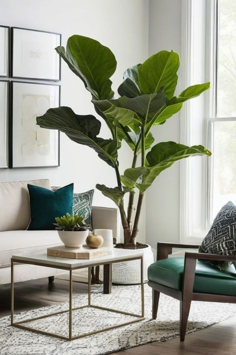 Discover the best artificial indoor plants to add a touch of greenery to your space! Elevate your decor with artificial potted plants like Indoor/Outdoor Monstera or Hanging Eucalyptus Plant. Enhance any room with Variegated English Ivy or Evergreen Artificial Living Wall. Create a lush oasis with Artificial Pothos Hanging Bush or Faux Philodendron Hanging Plants. Artificial Plant Living Room Decor, Plant Next To Couch, Faux Monstera Plant, Artificial Plant Decor Ideas, Tall Fake Plants Living Rooms, Living Room Artificial Plants Decor, Large Artificial Plants Living Rooms, Large Faux Plants Living Room, Artificial Plants Indoor Living Rooms