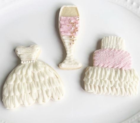 Buttercream Wedding Cookies, Buttercream Bridal Shower Cookies, Snow In Love Bridal Shower Cookies, Royal Icing Wedding Dress Cookies, Pink Bridal Shower Cookies Decorated, Bridal Shower Cookies Buttercream, Bridesmaid Royal Icing Cookies, Wedding Dress Cookies, Wedding Shower Cookies