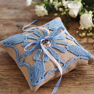 Make a hessian cushion and adorn it with an Irish crochet-style motif. Wedding rings have never been so spoilt. Crochet Ring Pillow, Diy Embroidered Pillow, Pillow Engagement Ring, Ring Bearer Pillow Lace, Holiday Crochet Patterns, Pink Wedding Rings, Wedding Ring Bearer Pillow, Pillow Crochet, Simply Crochet