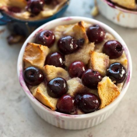 Fresh Cherry Bread Pudding. Easier to make than a tart or clafoutis bread pudding is the ideal way to enjoy the flavor of that most summery of fruits fresh cherries.  #fruity #recipes Cherry Bread Pudding Recipe, Cherry Bread Pudding, Almond Bread Pudding, Cherry Granola, Cherry Bread, Bread Pudding Easy, Dairy Free Baking, Chocolate Bread Pudding, Almond Bread