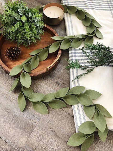 diy beauty Beautiful magnolia leaf garlands made of premium acrylic felt! Felt is made in the USA fr Felt Xmas Decorations, Felt Christmas Garland, Cer Nocturn, Magnolia Leaf Garland, Felt Garlands, Magnolia Leaf, Fabric Leaves, Fall Leaf Garland, Felt Leaves