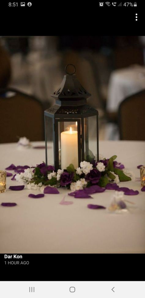 Purple Centrepiece Wedding, Flower Petal Wedding Table Decor, Purple Lantern Centerpieces, Plum Wedding Ideas Centerpieces, Black And Purple Wedding Centerpieces, Elegant Purple Wedding Decor, Purple Table Decorations Wedding, Purple And Green Wedding Centerpieces, Plum And Navy Wedding Centerpieces