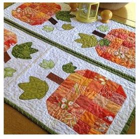 Scrappy Pumpkin runner by Angela Tackett Pumpkin Quilt Pattern, Pumpkin Quilt, Halloween Quilt Patterns, Small Quilt Projects, Fall Quilt Patterns, Fall Placemats, Pumpkin Table Runner, Quilted Placemats, Halloween Sewing