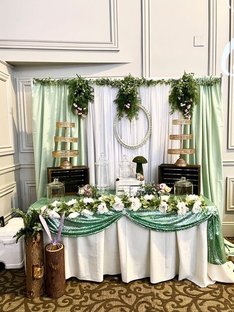 Sage green color theme dessert table that can be setup for a garden, fairy, or enchanted theme. Green Quince Table Decorations, Sage Green Quince Table, Sage Green Candy Table, Light Green Sweet 16 Theme, Sage Green And White Sweet 16, Sage Green Quince Theme, Sweet 16 Sage Green Theme, Mint Green Quinceanera Theme, Sage Quinceanera Theme