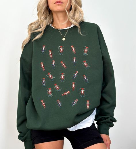 Nutcracker,Nutcracker Sweatshirt,Nutcracker Sweater,Retro Santa Sweatshirt,Pink Nutcracker,Vintage Nutcracker,Christmas Sweatshirt,Crewneck Nutcracker Sweater, Vintage Nutcracker, Pink Nutcracker, Vintage Nutcrackers, Festive Attire, Santa Sweatshirt, Retro Santa, Corporate Style, Winter Comfort