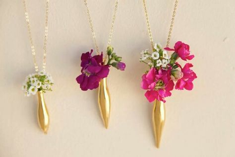 The perfect bridesmaid necklaces are these vase pendants by Fleurings.  Available in several different finishes and 3 sizes small medium and large. Shop and learn moee about these unique bridesmaid necklaces that let you hold water and flowers and keep blooms fresh for hours! Wear any flowers to like to match your bouquet or dress. Learn more and shop online at http://fleurings.com Vase Pendant, Vase Necklace, Bridesmaid Necklaces, Fresh Flower Jewelry, Elegant Vase, Unique Bridesmaid, Elegant Vases, Vase Flower, Flower Holder