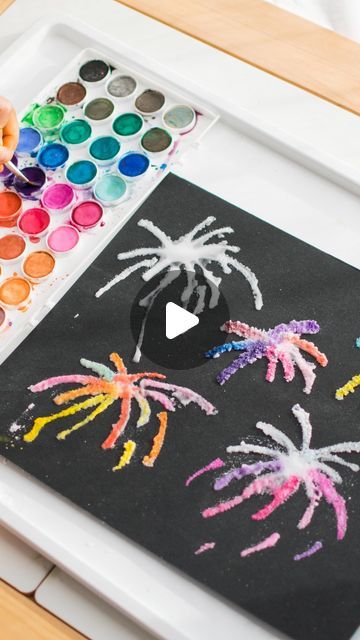 Inspire My Play ® on Instagram: "FIREWORK SALT ART . Just dropping in to re-share this fun firework activity that you might like to try alongside the New Year celebrations! We’ll be back sharing regular content and catching up on DM’s next week! . To make a salt painting you need: •glue in a squeezy bottle •table salt •watercolour paints • card . Simply squirt out your design in glue, cover in salt and use water colours to dab or drip onto the salt. . The watercolour bleeds into the salt and looks gorgeous 😍. Doing this on black paper makes the colours pop even more! . . . . . . . . . . #playideas #playathome #simpleplay #playmatters #earlyyears #earlylearning #playislearning #homeschoolpreschool #homeeducation #preschoolplay #preschoolactivity #preschoolathome #eyfs #eyfsteacher #eyfsi Salt And Glue Fireworks, Black Colour Day Celebration In Preschool, Fireworks Eyfs, Salt Watercolor, Eyfs Ideas, Salt Art, Salt Painting, Patriotic Food, Guy Fawkes