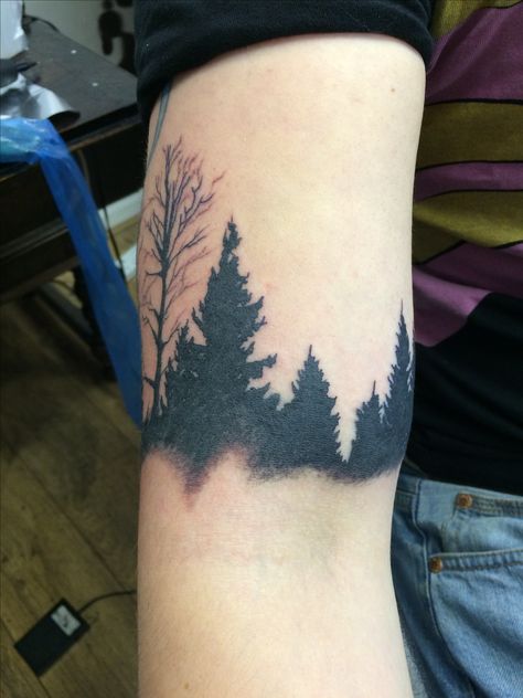 Tree silhouette tattoo done by Travis Allen at twisted tattoo Yaxley Www.twistedtattoo.co.uk Or fine us on Facebook Silouette Tattoo Black, Forest Silhouette Tattoo, Mtb Tattoo, Silouette Tattoo, Tattoo Lower Back, Tree Silhouette Tattoo, Tree Tat, Silhouette Tattoo, Meaning Tattoos