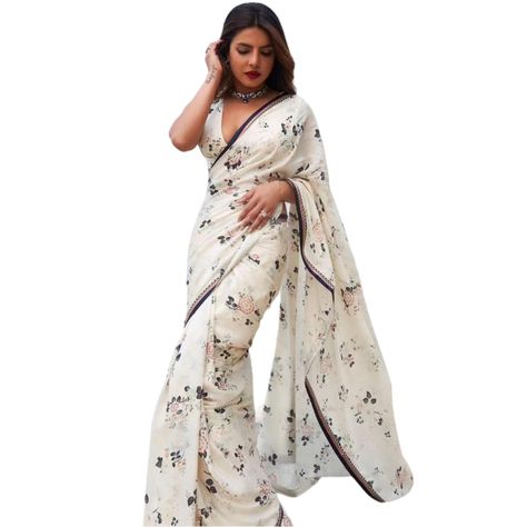 PRICES MAY VARY. Celebrati Inspired saree : Soft Georgette Digital printed Celebrati inspired Saree with beautiful Boarder and matching Blouse piece Length :- Saree Length is 5.5 Meter and Blouse Length is is 0.80 Meter. Package Included :- 1 Saree with Unstitched Blouse Piece Occasions :- Wash Care - Always dry clean for the first wash. For subsequent washes, if dry cleaninig is not possible, gently hand wash in cold water with soupnut or silk-suitable detergent or baby Sampoo. Color :- This Am Saree Layout, Indian Party Wear Dresses, Farewell Sarees, Sabyasachi Sarees, Pleated Saree, Silk Suits, Floral Saree, Indian Party Wear, White Saree