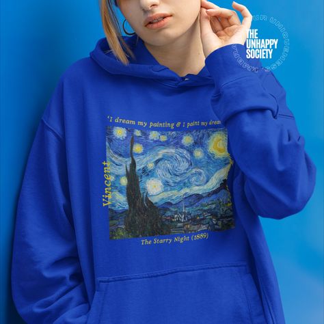 Vincent Van Gogh's famous painting "Starry Night" is a masterpiece that has captivated art lovers for generations. The combination of this artwork with a quote by Van Gogh himself, adds a touch of inspiration and motivation for all those who have a passion for painting. Get your hoodie today and enjoy the warmth and inspiration it brings. Also a great gift idea!🌟 #vangoghpaintings #vincentvangogh #painteraesthetic #starrynight #famouspaintings #vangoghgifts #painter #arthoodie #artsyaesthetic Starry Night Shirt, Van Gogh T Shirt Design, Van Gogh Hoodie, Van Gohn Paint Starry Night, Aesthetic Artsy, Van Gogh Famous Paintings, Vincent Van Gogh Tshirt, Van Gogh Quotes, Van Gogh Gifts