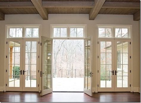 Loving the three sets of doors out onto the deck. I imagine the wooded area looks amazing in the warmer seasons. #decor #doors French Doors With Transom, Transom Windows, Floor To Ceiling Windows, Patio Doors, Double Doors, My Dream Home, Future House, Architecture Details, French Doors