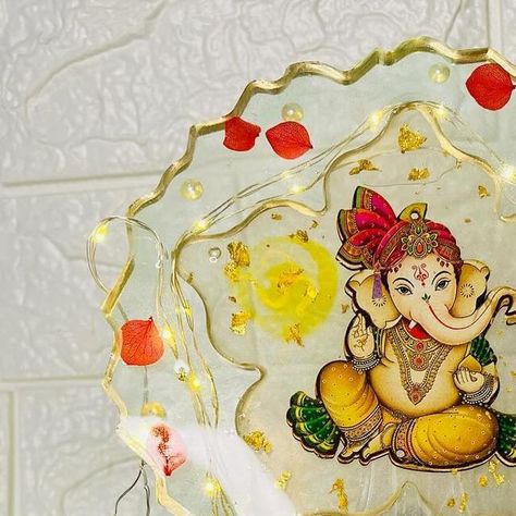 SP Resins, Arts and Crafts on Instagram: "SP Resins Ganesha Frame 

Use- Made of resin, can be used for interior and exterior home deco, Gifting purposes, comes with fairy light & stand. 

Price - Rs699/- each + shipping charges 

DM to place your order! 

#resin #resinart #artist #epoxy #ganesha #interior #gift" Light Stand, Exterior Home, Fairy Light, Ganesha, Fairy Lights, Resin Art, Home Deco, Interior And Exterior, House Exterior