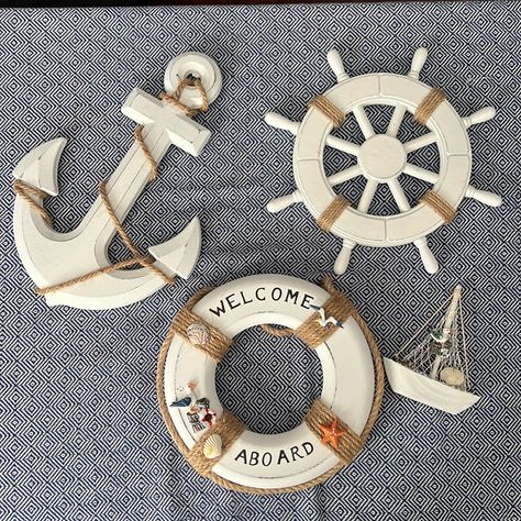 Four Piece Nautical Themed Decor. The Anchor, Life Raft, And Wheel Can Be Hung. This Set Was Purchased From Amazon For A Nautical Themed Baby Shower. However, It Was Never Used. Measurements Are Included In Pictures. The Sailboat Is About 5 Inches Tall (I Ran Out Of Picture Space). Nautical Beach House, Life Raft, Nautical Theme Decor, The Anchor, Themed Decor, Nautical Theme, Home Wall Decor, Colorful Decor, Baby Shower Themes