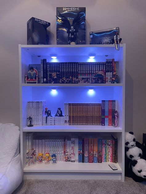 manga, anime figures, LED lights Manga Shelf Aesthetic, Manga Shelf Ideas, Unrealistic House, Manga Bookshelf, Book Corner Ideas Bedroom, Manga Shelving, Bookshelf Inspo, Manga Shelf, Gothic Cottagecore