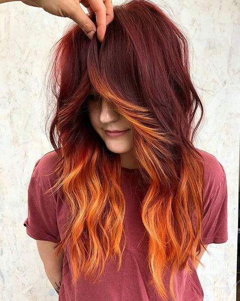 Red Hair With Different Color Bangs, 2023 Fashion Trends Hair, Auburn And Burgundy Hair, Red And Purple Pixie Hair, Color Bangstyle Hair, Fire Hair Color Ideas, Older Punk Women, Natural Red Hair With Black Highlights, Dark Red Hair With Orange Highlights