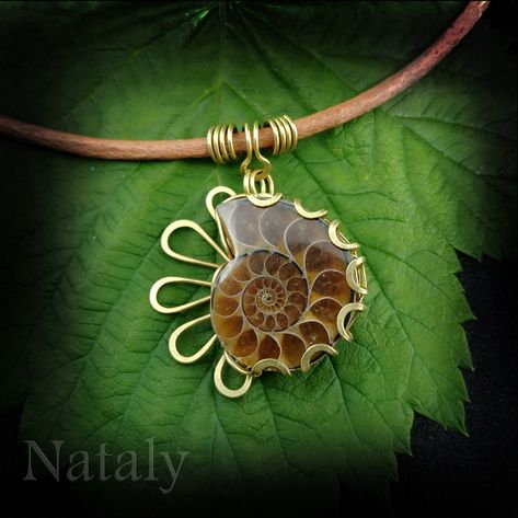 This listing is for stylish wire wrapped pendant with charming ammonite fossil. Looking for unisual minimalist necklace to spoil yourself or for gift? This fossil necklace is a great choice. Stylish double sided gemstone necklace is very versatile. You can wear it either with evening dress or casual blouse. Unique Boho necklace for women with style is absolutely eye-catching.  Order this beautiful ammonite necklace right now!  SIZE AND MATERIALS * The length of a pendant is 47mm (1.86'') Please Ammonite Necklace, Fossil Necklace, Wrapped Crystals, Ammonite Jewelry, Gemstone Choker Necklace, Bling Things, Wire Pendants, Pendant Ideas, Wire Wrapped Stone Jewelry