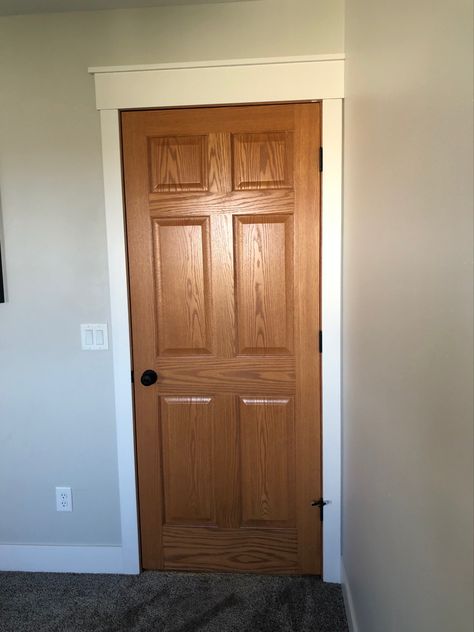 White Trim Oak Doors, Oak Doors With White Trim, Wood Doors White Trim, Sw Pure White, Bedroom Door Knobs, Off White Paint Colors, Black Door Knobs, Oak Interior Doors, Oak Door