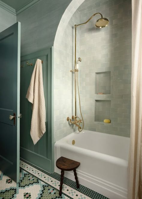 Explore a Vibrant Craftsman Home That Blooms with Color and Pattern Built In Soaking Tub Shower Combo, Undermount Bathtub Shower Combo, Small Bathroom Shower And Tub Ideas, Small Updated Bathroom, Unique Tub Shower Combo, Bathroom Remodel Narrow Layout, Bathroom Arch Over Tub, Bathtub With Pony Wall, Small Bathroom With Vanity Area