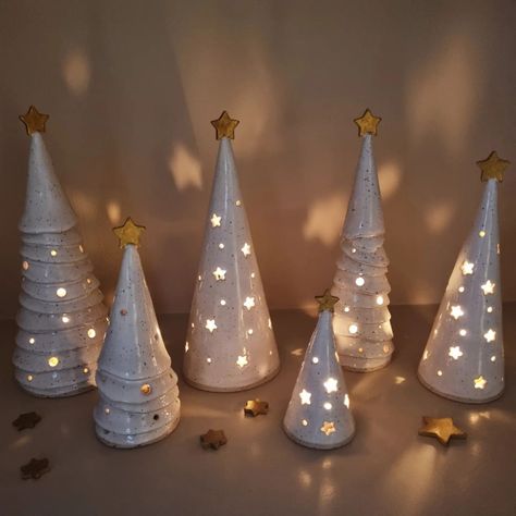 ✨️ Elevate your Holiday decor with these handmade, unique ceramic Christmas trees/ luminaries ✨️. Designed to bring warmth and coziness to your festive celebrations ✨️ . #Etsyshop #ceramictree #christmasdecorations #christmastree #coastaldecor #austria #Estland #Norway #Denmark #missouri #Washington #California #Arizona #Maryland #Paris #Seattle #Boston #Newyork #Newjersey #Virginia #Quebec #Ontario #Iowa #Philadelphia #Ohio #Pennsylvania #Kansas #Vienna #Connecticut #rhodeisland Ceramic Christmas Trees, Ceramic Christmas, Unique Ceramics, Coastal Decor, Christmas Trees, Christmas Decorations, Christmas Tree, Etsy Shop, Ceramics