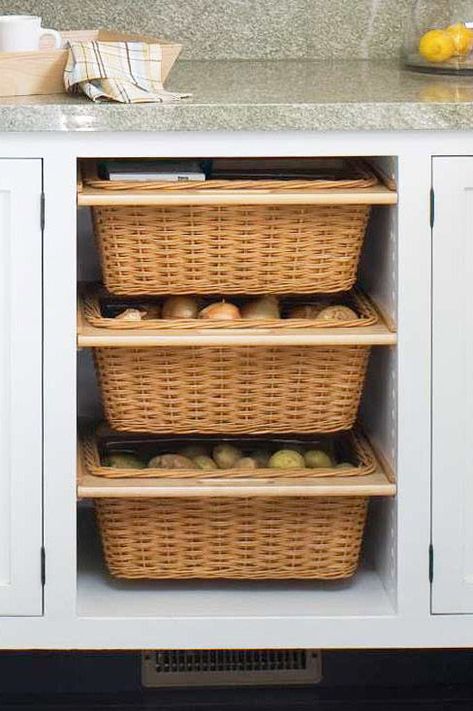 Redoing your kitchen cabinets? Consider adding a couple of slide-out baskets, which are ideal for storing vegetables that don't need to be refrigerated, such as onions and potatoes. #organization #storageideas #kitchenorganization #bhg Barndoor Hardware, Onion Storage, Kitchen Island Storage, Produce Storage, Kitchen Necessities, Kabinet Dapur, Diy Kitchen Storage, Kitchen Cabinet Storage, Kitchen Room Design