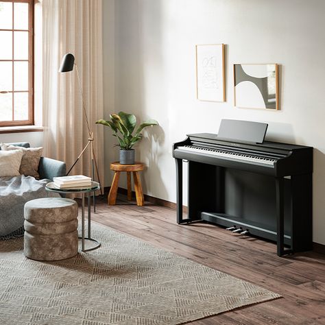 Discover the perfect blend of tradition and innovation with the Clavinova CLP-825. It features a GrandTouch-S keyboard with escapement for a truly realistic grand piano experience and seamless integration with smart devices to ensure endless entertainment and learning possibilities.   With a space-saving console, unmatched quality, and world-class sound, the CLP-825 is a standout instrument. Piano Table Ideas, Small Living Room With Piano, Piano Apartment, Yamaha Clavinova, Piano Living Rooms, Piano Table, Piano Decor, Piano Lamps, Console Styling