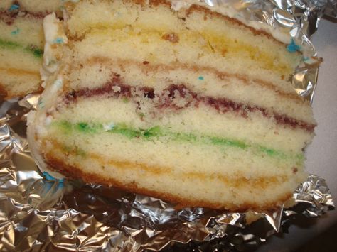 A close up view slice of the Crucian Vienna cake. Vienna Cake Virgin Islands Recipe, Susan’s Lemon Cake, Slovenian Cream Cake, Latvian Honey Cake, Vienna Cake, Caribbean Cake, Sicilian Cassata Cake, Black Cake, Delicious Cake Recipes