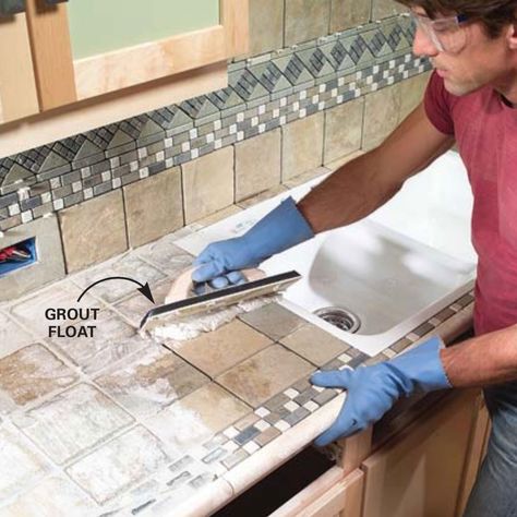 we did the grouting. We found it a lot easier to get behind the sink Installing Tile, Tile Countertop, Tile Countertops Kitchen, Cocina Shabby Chic, Kitchen Remodel Countertops, Tile Counters, Kitchen Design Diy, Tile Countertops, Diy Countertops