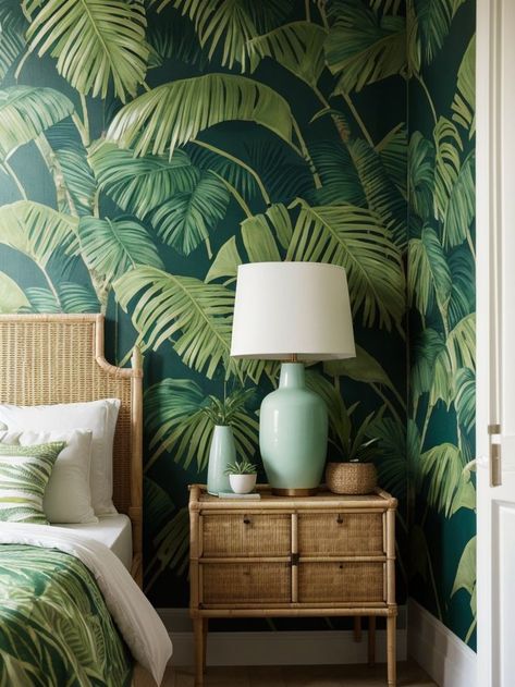 Incorporate tropical vibes into your bedroom with a vibrant accent wall featuring a palm leaf print wallpaper. Complete the look with rattan furniture and add fresh greenery to create a tropical oasis in your own home. Tropical Oasis, Palm Leaves Print, Rattan Furniture, Print Wallpaper, Tropical Vibes, Accent Walls, Palm Leaf, Leaf Print, Home Decorating