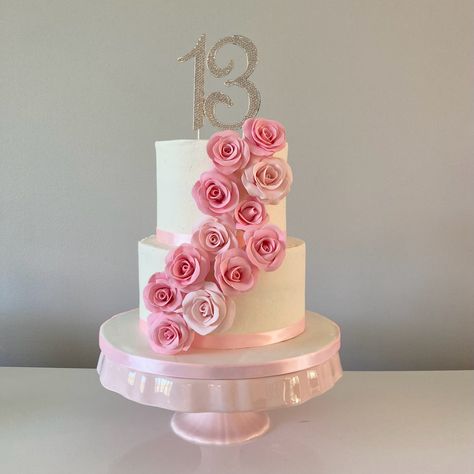 White buttercream cake with pink gumpaste roses 13th Birthday Cake Girl, White Buttercream Cake, Gumpaste Roses, 13th Birthday Cake, 13 Year Girl, White Birthday Cakes, 13 Birthday Cake, Anime Cake, White Buttercream