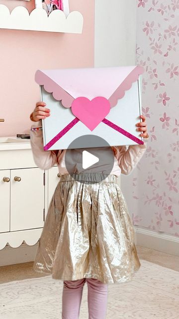 S T E P H ⭐️DIY Creator + Maker on Instagram: "Crafting Love💌 Oversized style with a giant heartfelt Valentine!🫶🏻 + Although I made a pink + purple one for each of my girls doors this one could also be a gift box or even a classroom Valentine “mail box.”However you need to MAKE it - I can’t wait to see! ✨ . Want to MAKE one? . Box (mine is Mini Maker Design Cos craft kit box) Card-stock 12x12 Card-stock (desire colors for details) Sticky back dots Washi tape Scissors Gaffer tape For my exact supplies comment “giant” . Share with someone who’s looking for a unique Valentine craft💜 . . . . . . . . . . #valentinemailbox #valentinegifts #valentinecards #valentinecard #valentineformyvalentine #handmadevalentine #handmadevalentines #howiholiday #holidayswithkids" Valentine’s Day Boxes Ideas, Valentines Day Boxes For School For Girl, Valentines Day Box Ideas, Diy Valentine's Mailbox, Valentine Boxes For School, Valentine Mailbox, Valentine Craft, Gaffer Tape, Valentine Day Boxes