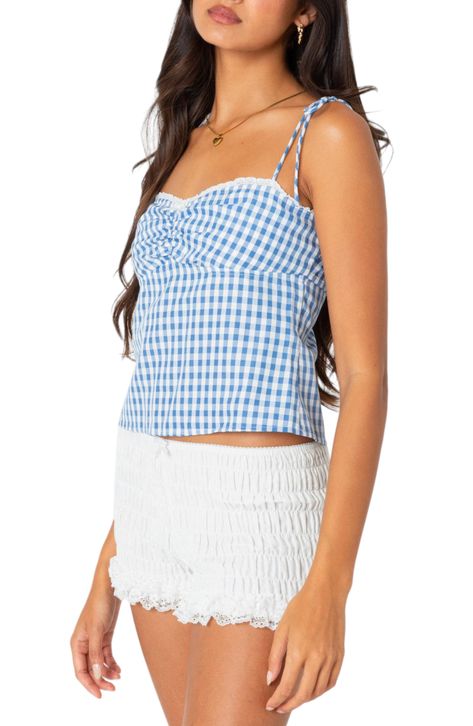 Picnic-ready gingham covers this sweet camisole detailed with lace trim at the sweetheart neckline and slender ties at the back and shoulders. Ties at back Sweetheart neck Adjustable tie straps 100% polyester Machine wash, dry flat Imported Aesthetic Plaid, Plaid Clothing, Gingham Top, Summer Vest, Bloomers Shorts, Womens Camisoles, Plaid Outfits, Gingham Pattern, Gingham Tops