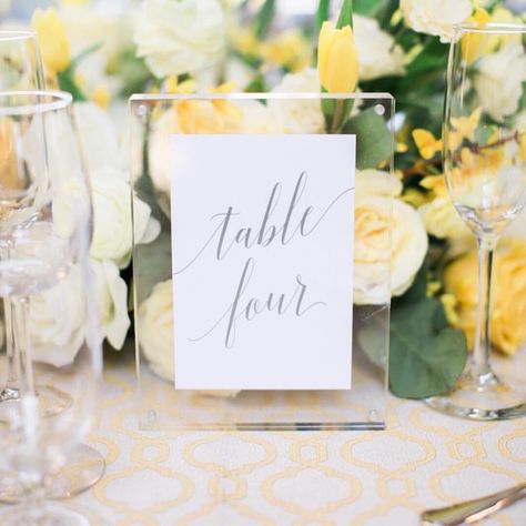 Our rentable acrylic frames make the best table numbers!!! | @paperdaisiesstationery | #wedding #weddingday #weddingstationery #weddingdecorations #weddingdecor #weddinginspiration #weddingcenterpieces #weddingtable #tablenumbers #sprindwedding #summerweddings Acrylic Frame Table Numbers, Clear Table Numbers, Framed Table Numbers Wedding, Table Number Frames, Simple Table Numbers, Colorful Tablescapes, Framed Table Numbers, Paper Daisies, Table Number Stands